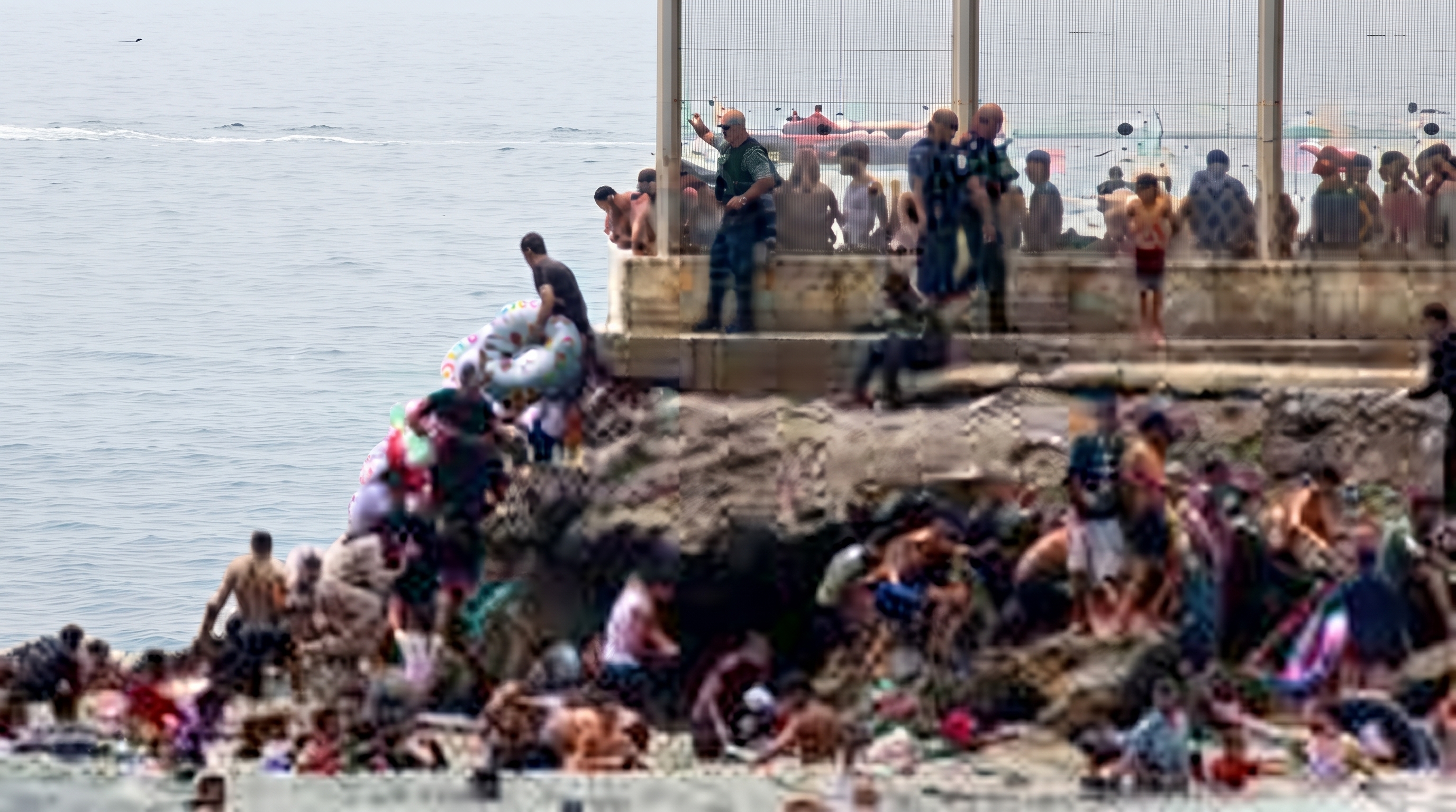 Spanish military stands guard at the border between Ceuta and Morocco