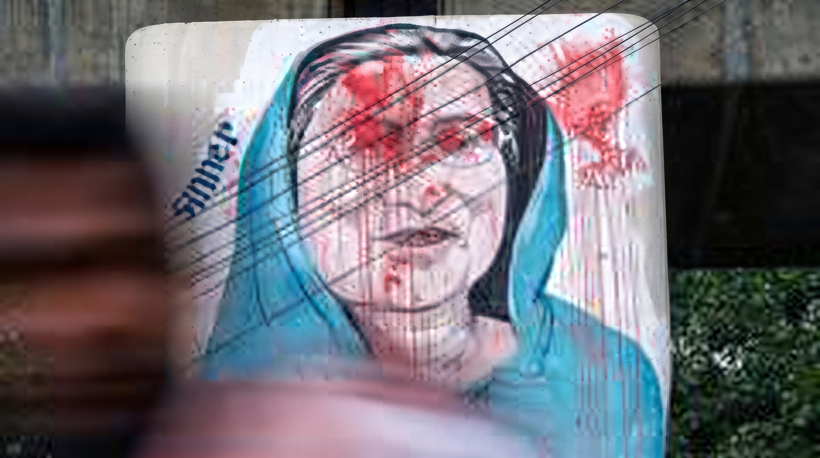 Images of Sheikh Hasina defaced in the Bangladeshi capital Dhaka