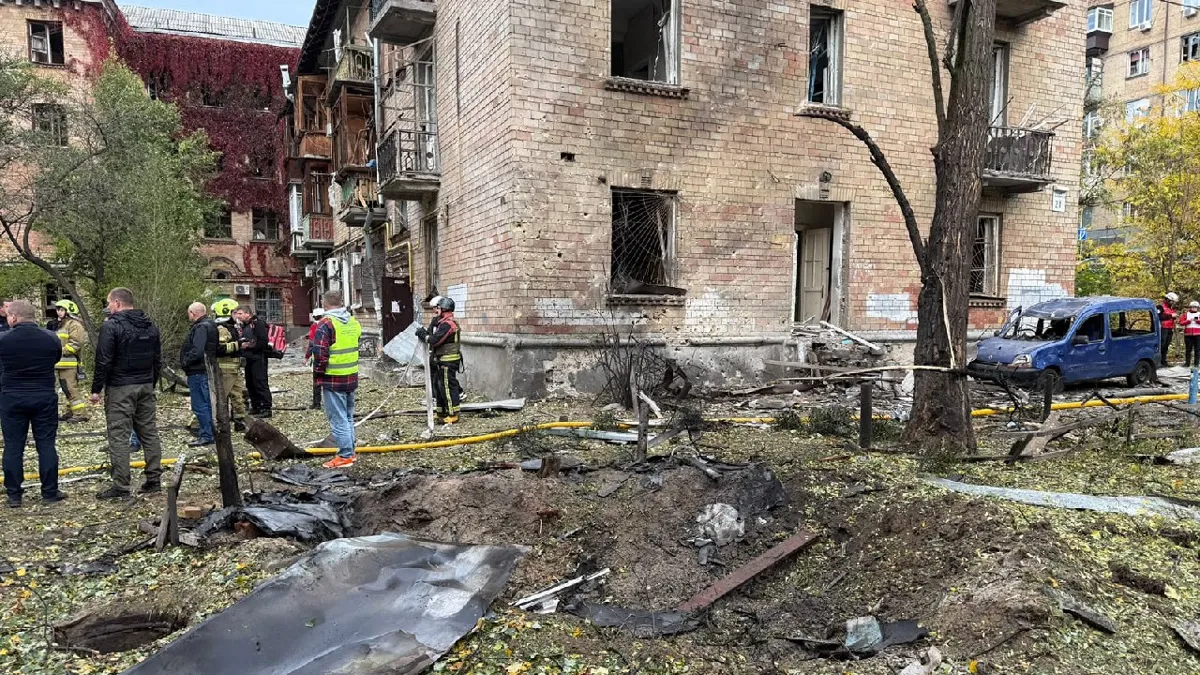 Drone crash scene in Kyiv Pechersk district with fire and emergency responders