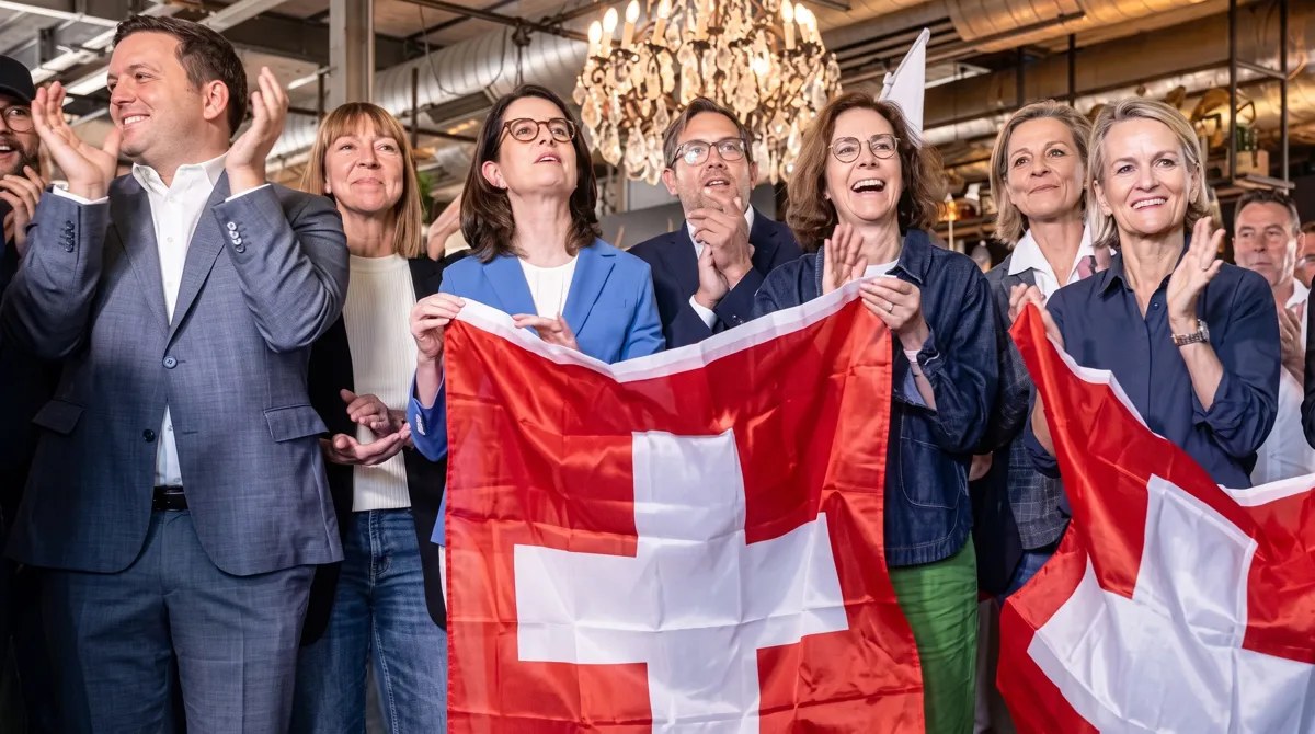 Swiss voters at polling station during neutrality referendum