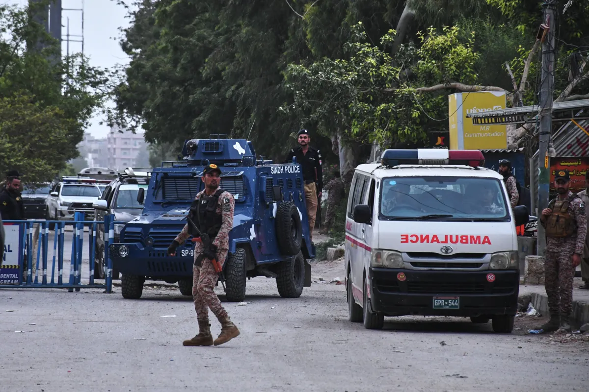 Pakistan Rangers paramilitary soldiers guard a road near attack site in Karachi