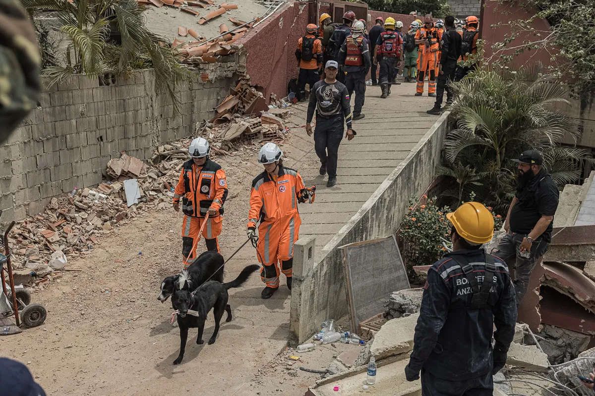 Rescuers work on operations in earthquake-hit area of La Guaira, Venezuela