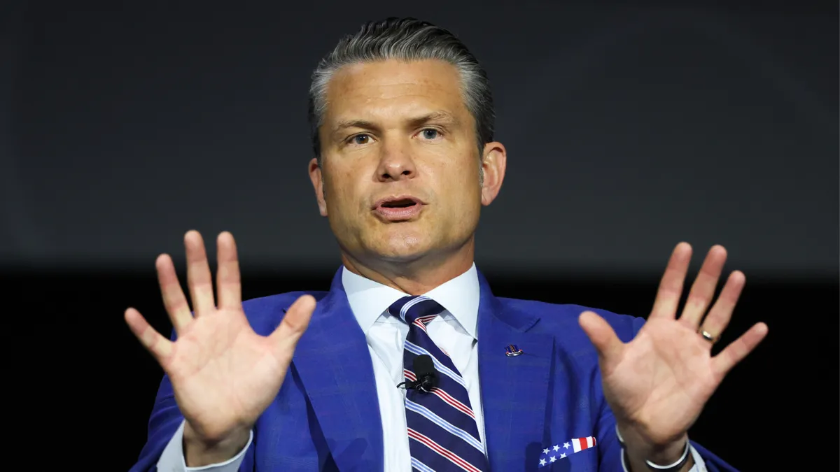 Pete Hegseth speaking to reporters