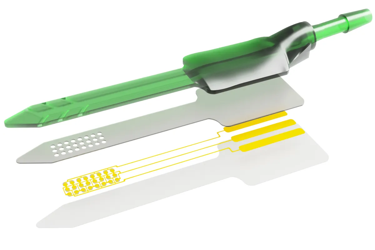 LUCID ultrasound drug-delivery implant prototype next to a coin